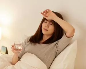 具合が悪い女性